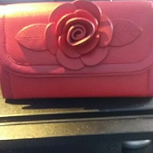 Elegant Red Floral Women's Clutch; Slight imperfection On The Back Of The Purse.